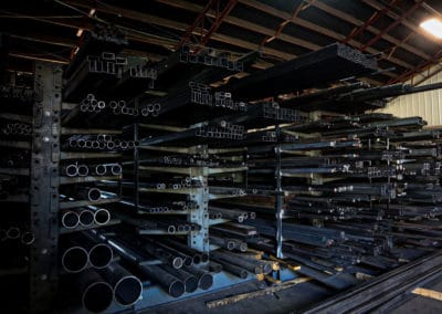 bent sheet metal in different lengths and widths. shows how metal distributors conducts metal bending and metal cutting.
